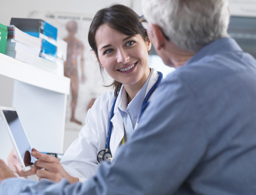 doctor sharing health information on digital table 2024 10 18 09 24 42 utc