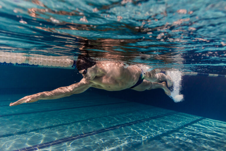 underwater picture of young swimmer in cap and gog 2024 11 18 04 01 48 utc